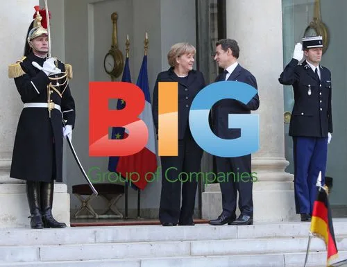 Sarkozy Awaits Merkel at Elysee Palace