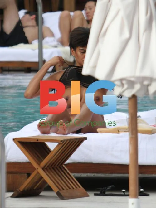 Georgette Eto'o sunbathing topless in Miami
