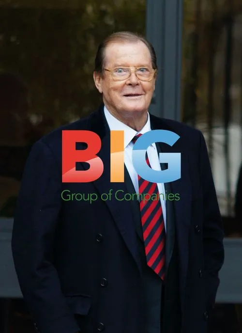 Roger Moore waves at ITV studios