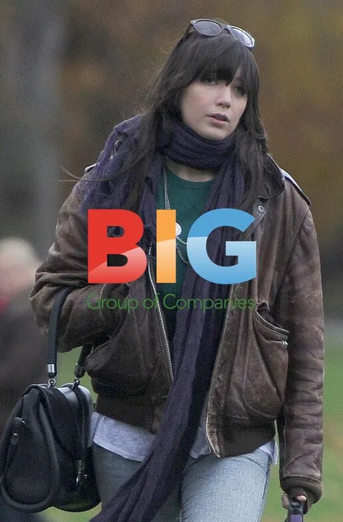 Daisy Lowe Walking Dog in Park