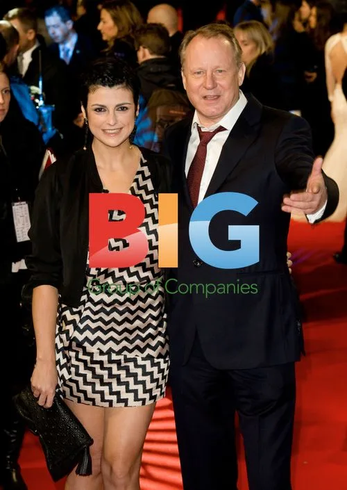 Megan Everett and Stellan Skarsgard at 'The Girl With The Dragon Tattoo' Premiere