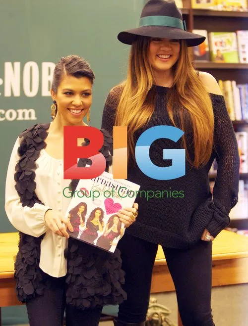 Kardashian Sisters Pose for Book Signing