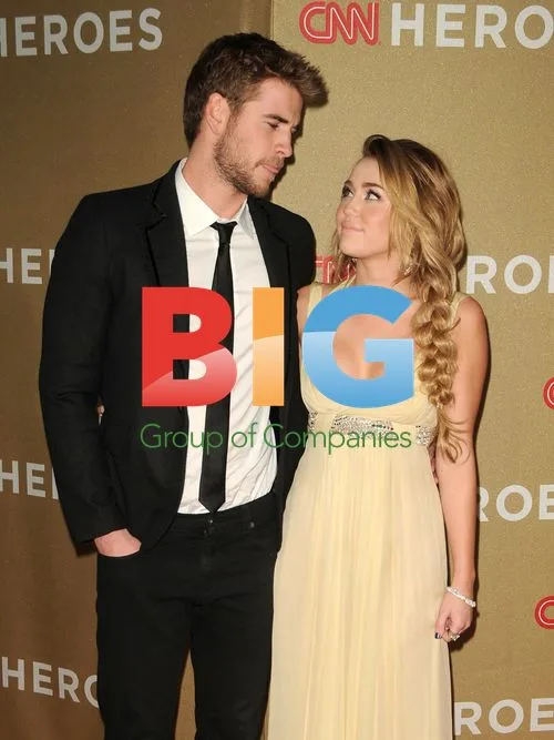 Liam Hemsworth and Miley Cyrus at 2011 CNN Heroes