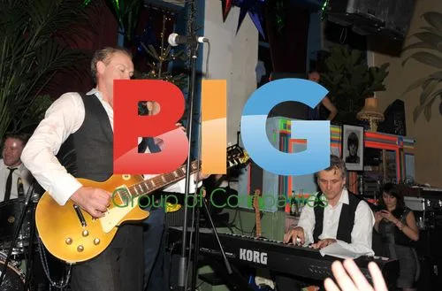 Gary Kemp and Guy Chambers perform at Xmas party