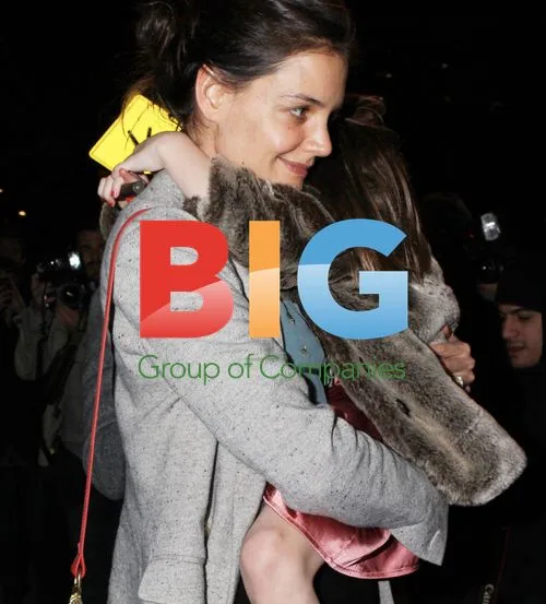 Katie Holmes and Tom Cruise take Suri out in NYC