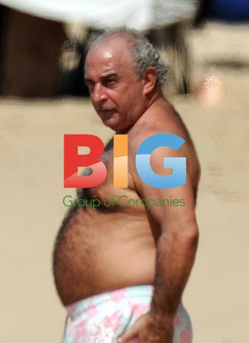 Philip Green Relaxes on Caribbean Beach
