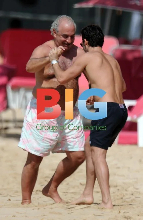 Philip Green Soaks Up Caribbean Sun