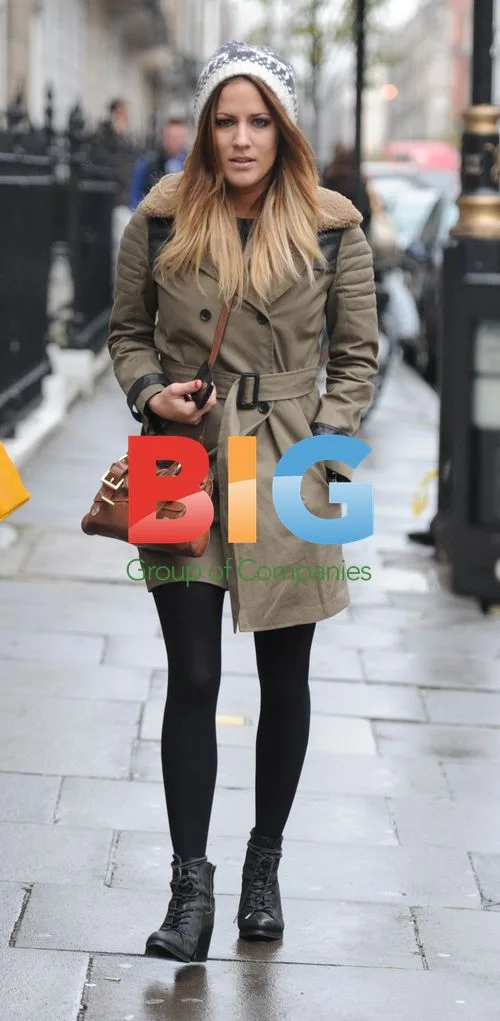 Caroline Flack out in London rain