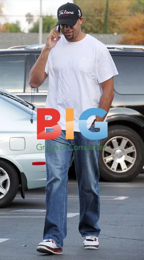 Hank Baskett Chatting on Phone