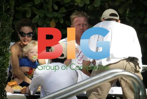 Boris Becker Enjoys Family Poolside Meal