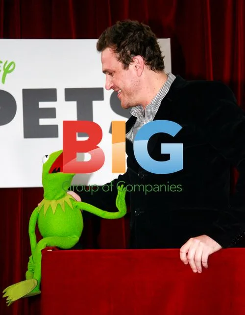 Jason Segel with Kermit the Frog at Muppets Premiere
