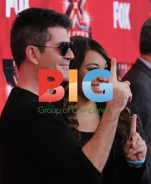 Melanie Amaro with Simon Cowell