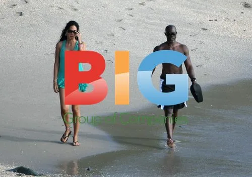 Djimon Hounsou and Kimora Lee with son on beach