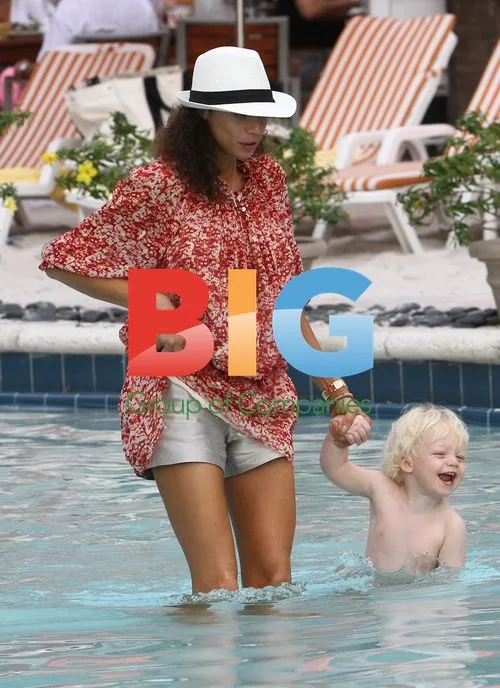 Baby Amadeus with mom Sharlely Lilly Kerssenberg at pool in Miami