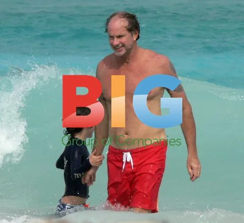 Chad Smith on Beach with Son in St. Barth