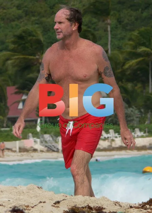 Chad Smith Vacations with Son in St. Barth