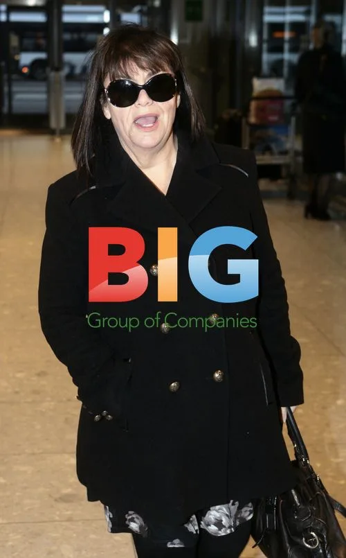 Dawn French Departs Heathrow