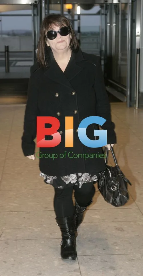 Dawn French Departs Heathrow