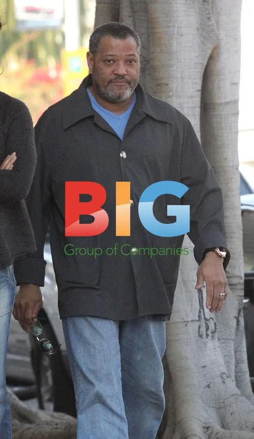 Laurence Fishburne and Gina Torres Shopping