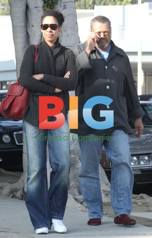 Laurence Fishburne and Gina Torres Window Shopping