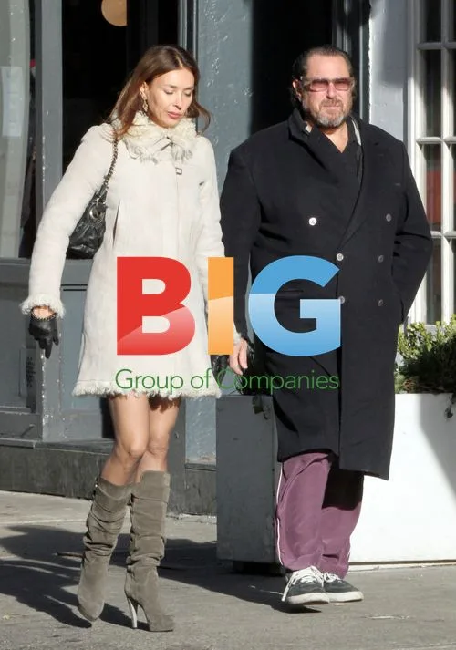 Julian Schnabel and wife window shopping in Soho