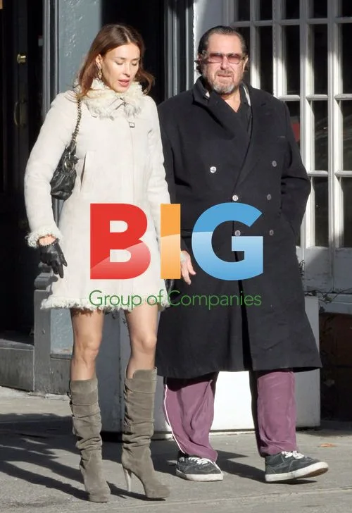 Julian Schnabel and wife window shopping in Soho