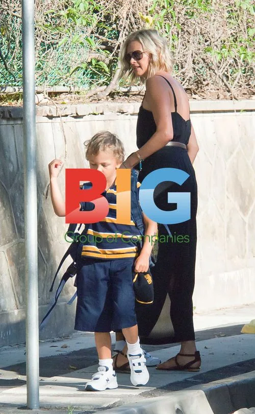 Sarah Murdoch takes sons to school for first day