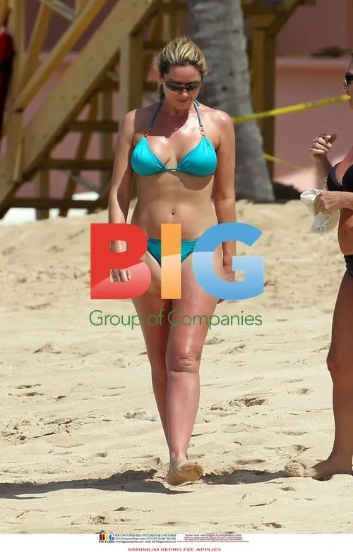 Claire Sweeney in Turquoise Bikini