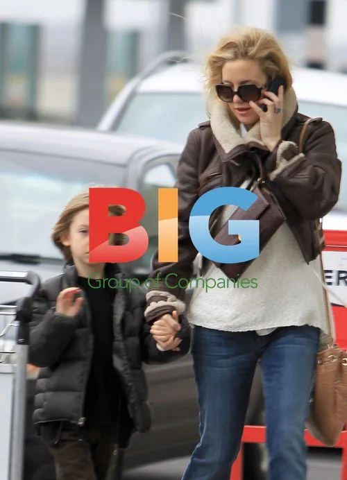 Kate Hudson and son Ryder at UK airport