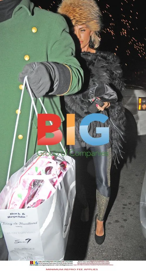 Katie Price out with aide in London