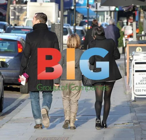 Jude Law and Sadie Frost stroll with daughter Iris