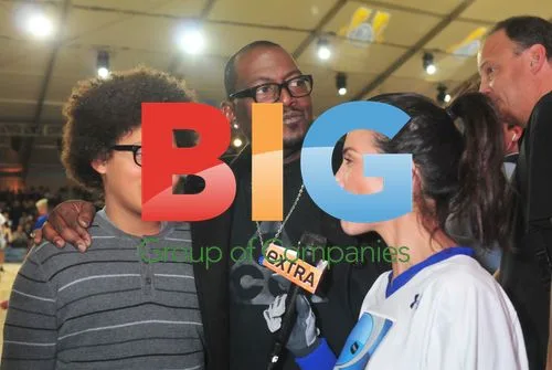 Randi Jackson and son at Celebrity Beach Bowl