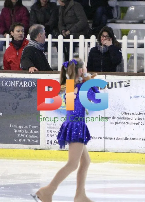 Princess Caroline watching Alexandra ice skate