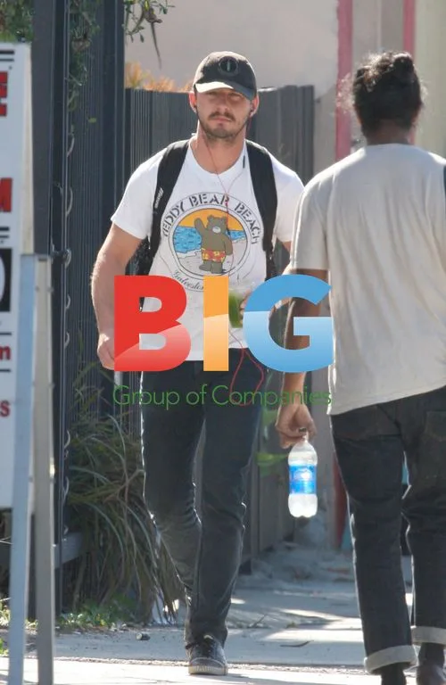 Shia Labeouf Walks and Drinks After Workout