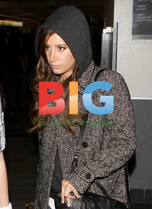 Ashley Tisdale Arrives at LAX Airport