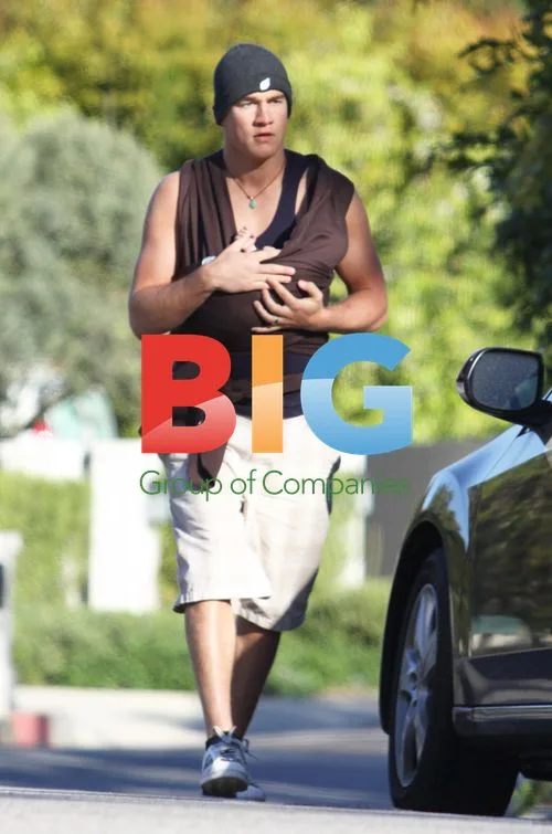 Alanis Morissette's husband takes son for a walk