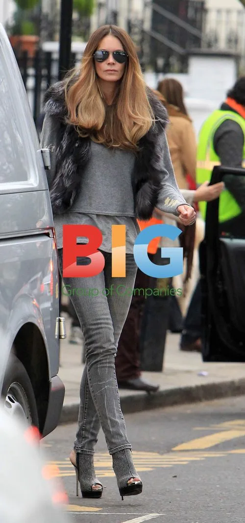 Elle Macpherson on school run in London