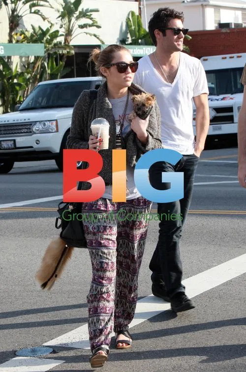 Miley Cyrus with Josh Bowman and Puppy