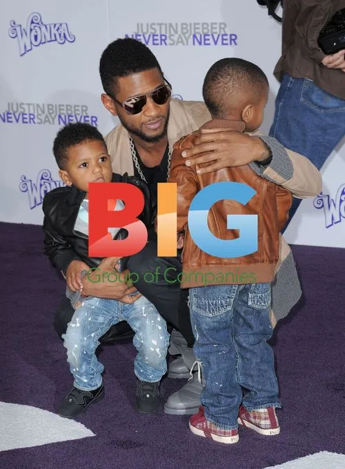 Usher and sons at "JUSTIN BIEBER: NEVER SAY NEVER" premiere