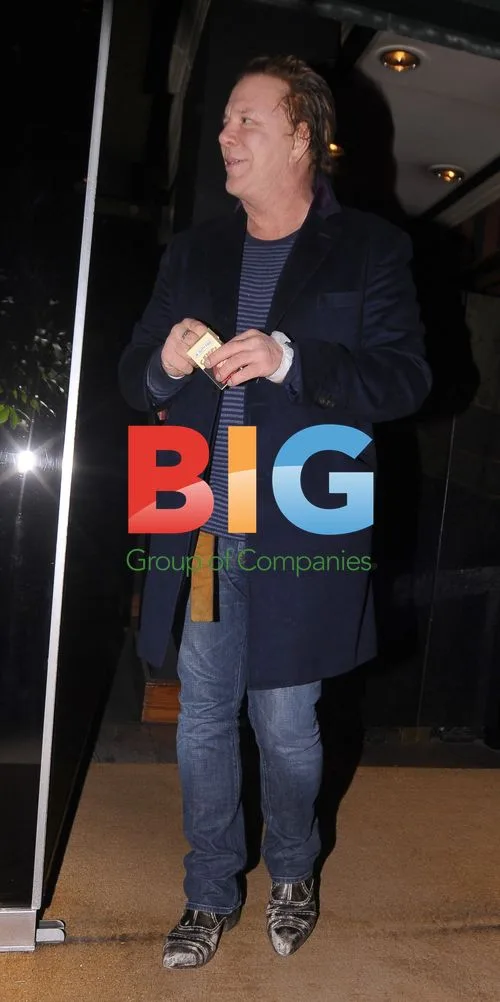 Mickey Rourke Leaves London Restaurant with Companions