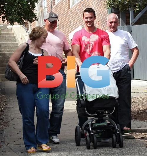 Kris Smith with Baby Ethan at Bondi