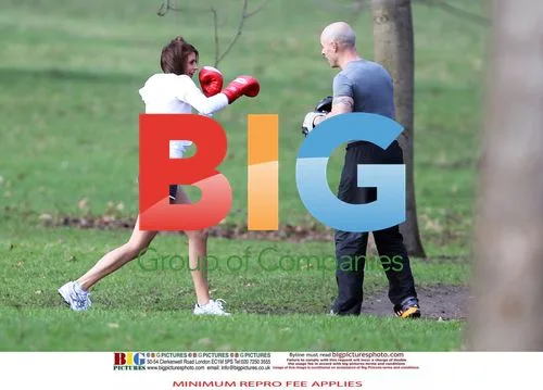 The Apprentice's Liz Locke exercises with trainer