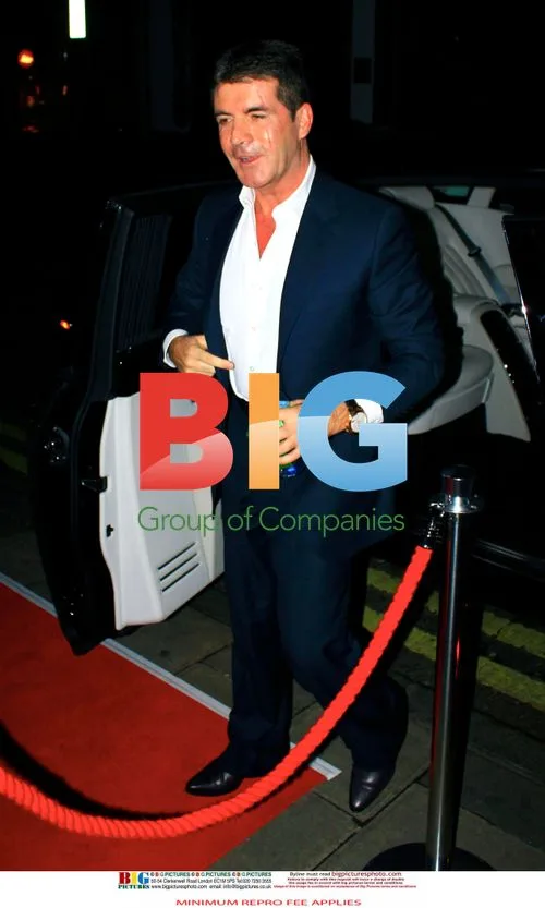 Simon Cowell and Mezhgan Hussainy at Fancy Dress Party