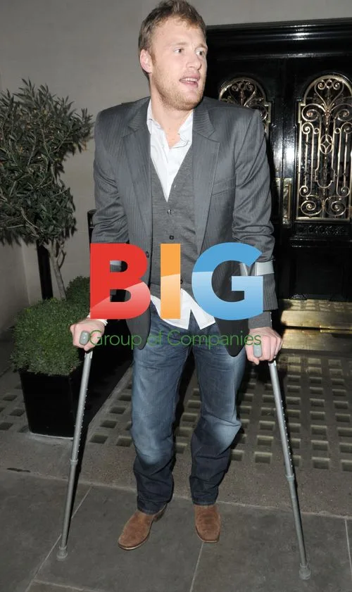 Ex-England cricketer Freddie Flintoff leaves restaurant on crutches