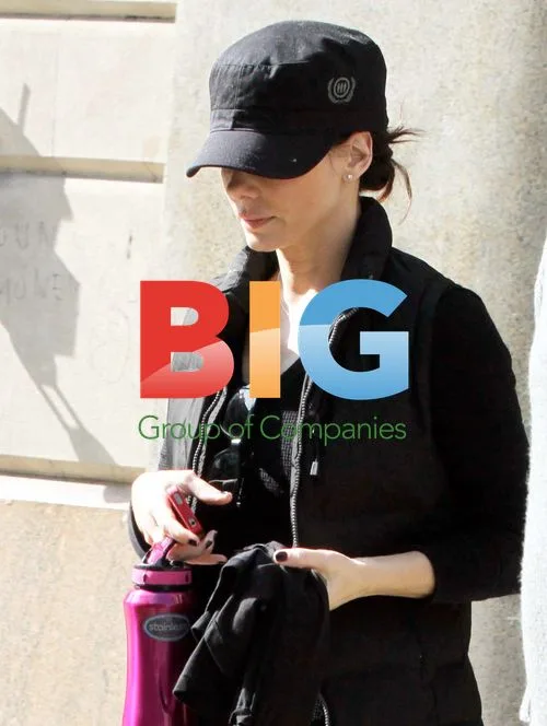 Sandra Bullock Leaves NYC with Bodyguard