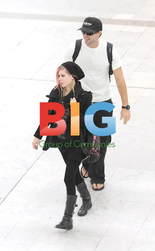 Avril Lavigne and Brody Jenner Arrive in Nice