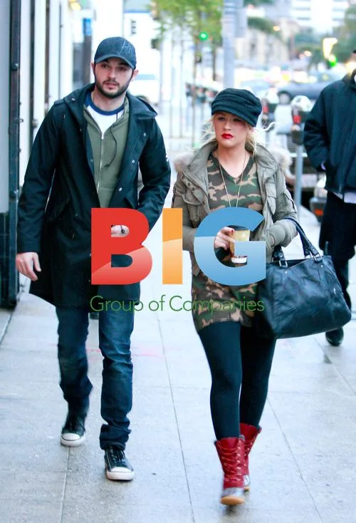 Christina Aguilera and Matthew Rutler Shop for Kids Clothes