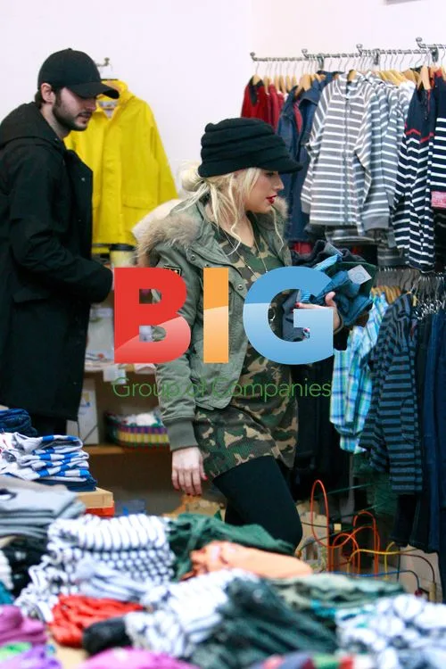 Christina Aguilera and Mathew Rutler Shop for Children's Clothing