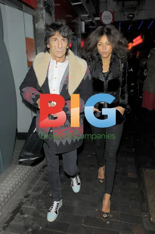 Ronnie Wood and Ana Araujo Leaving The Box