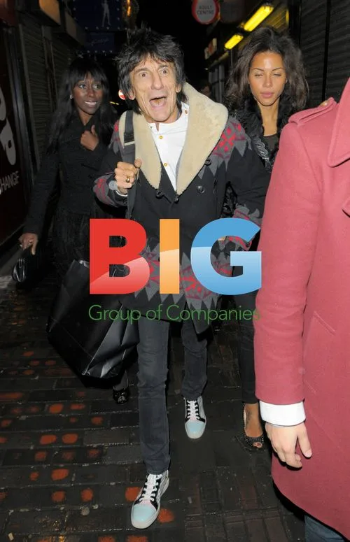 Ronnie Wood and Ana Araujo Leaving The Box in London